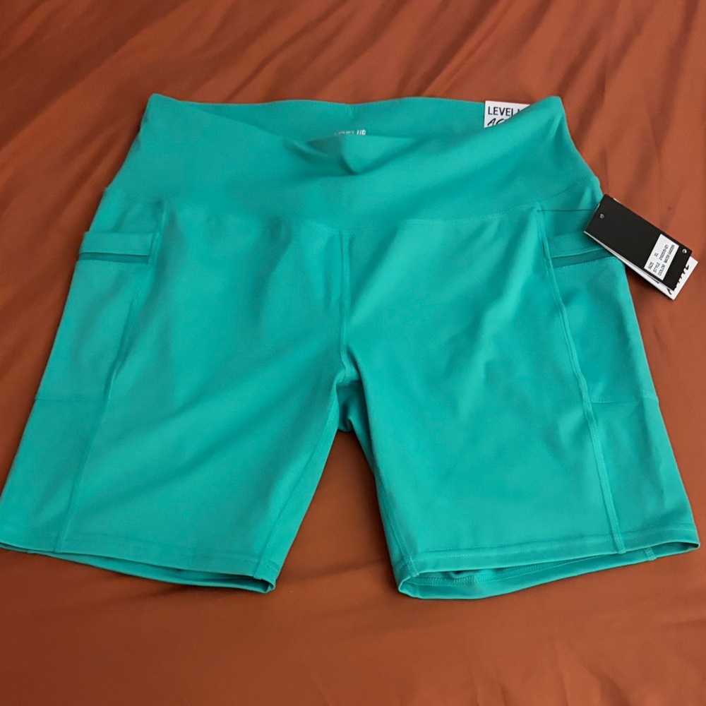 High-Rise Teal Bike Shorts with Side Pockets